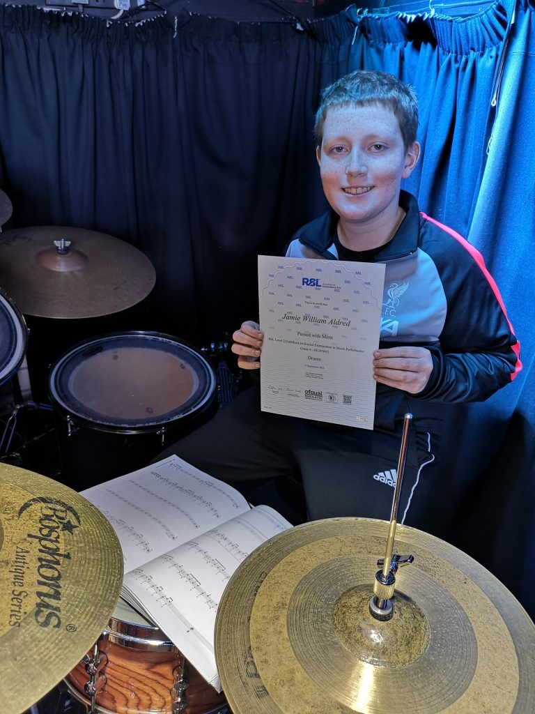 Jamie Grade 5 Rockschool Picture Success