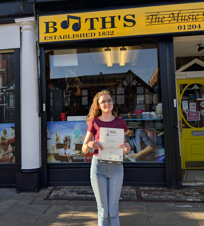 Grace exam pass drum student