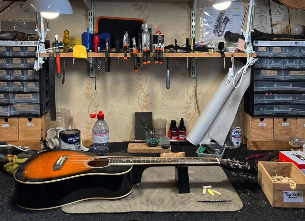 Instrument Repairs - Guitar Setups and guitar restrings on Bench