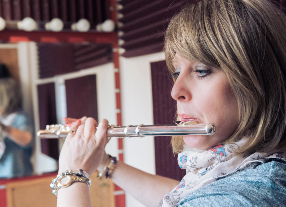 Student playing a Flute at Booths Bolton