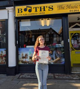 Grace exam pass drum student